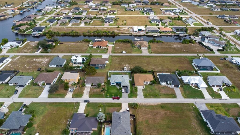 View of property location with nearby suburban area and a large body of water