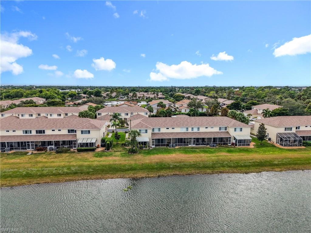 Aerial view of residential area with a large body of water