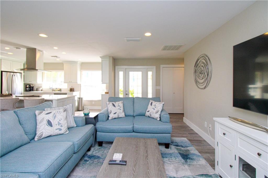 Living room featuring wood-type flooring