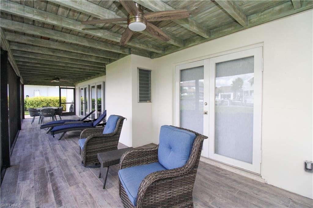 View of patio / terrace with ceiling fan and french doors