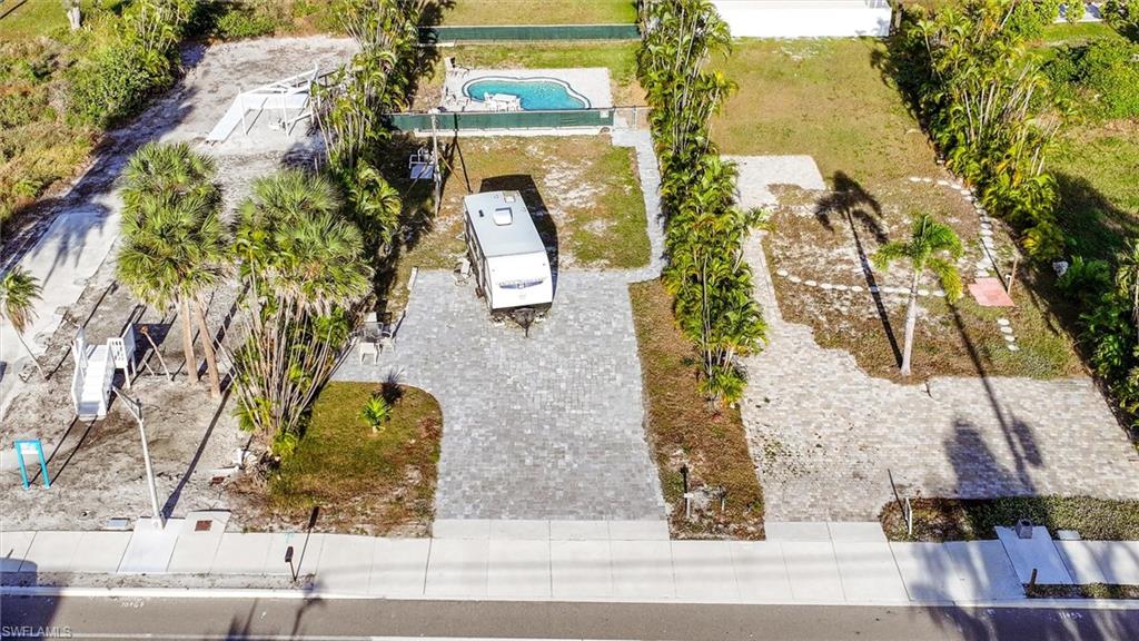 Drone / aerial view of a pool area