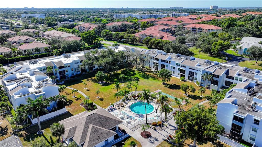 Aerial View Of Courtyard, Pool, Community Club House And Back Of Buildings!