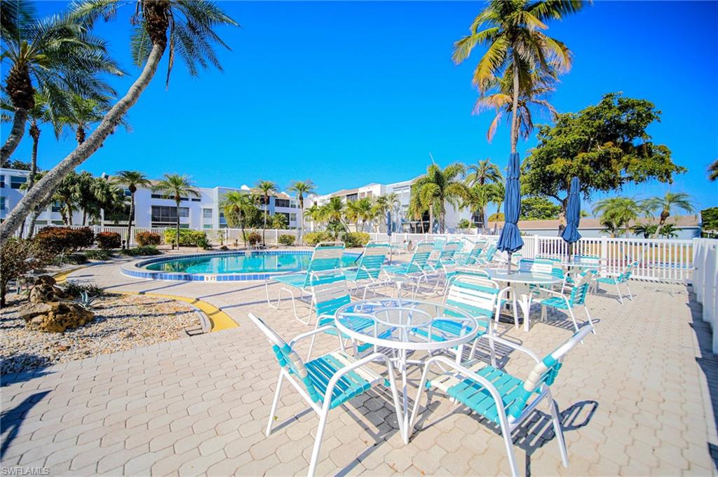 Community pool featuring a patio area