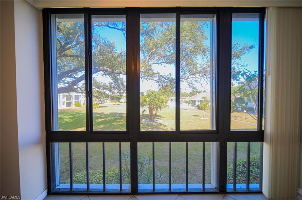 Great Ceiling To Floor View Of Courtyard Area!