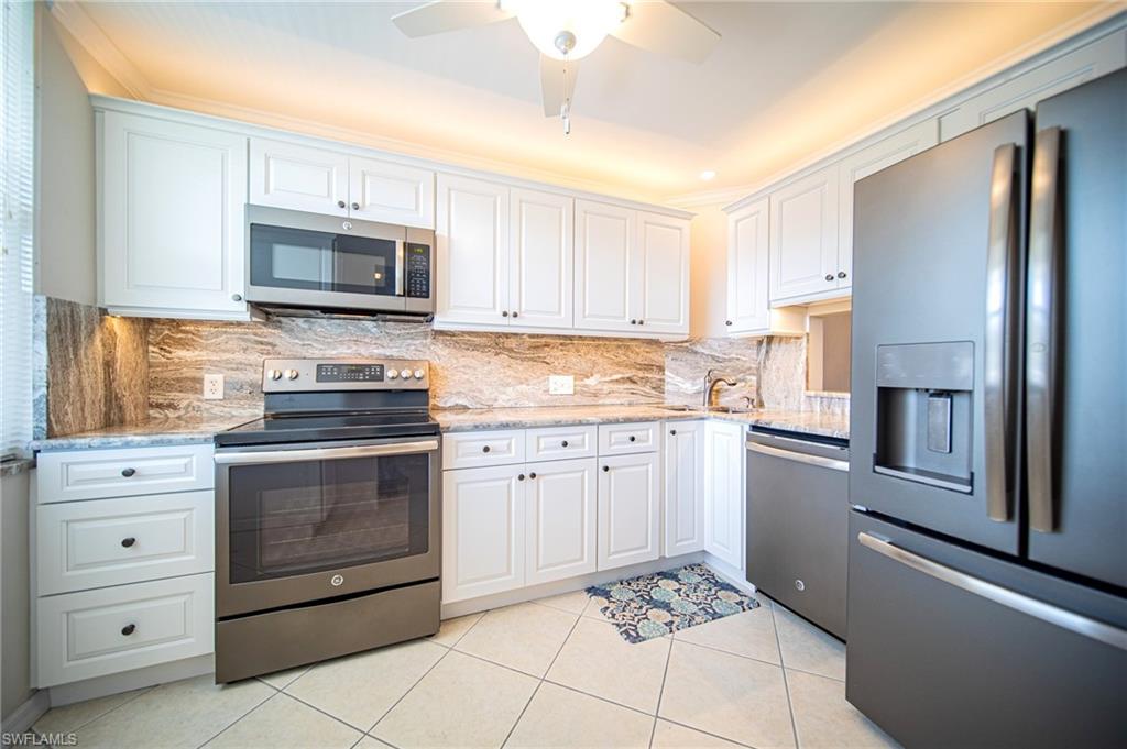 This Updated Kitchen Features Stainless Steel Appliances, Granite Countertops And Backsplash, White Wooden Cabinets & Drawers, A Large Pantry, A Passthrough To The Dining Room, And Lots Of Natural Lighting!