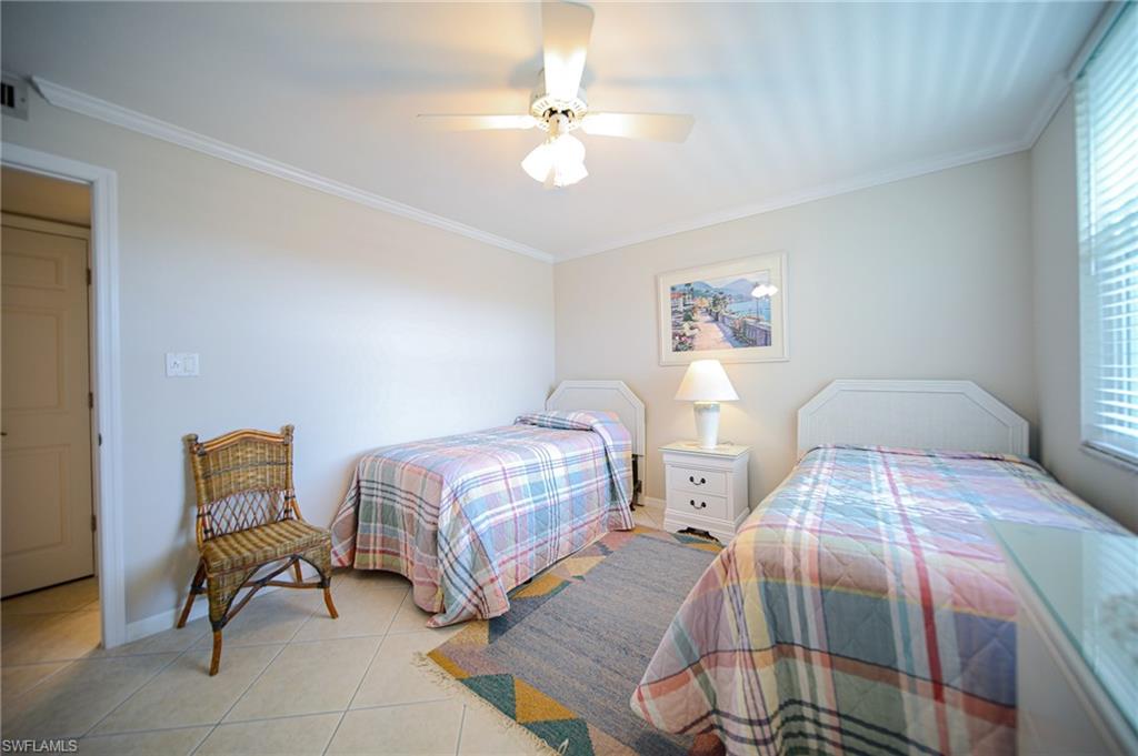 The Spare Bedroom Comes With Two Beds, Dresser With Mirror, Nightstand With Light, And Ceiling Fan/Light!