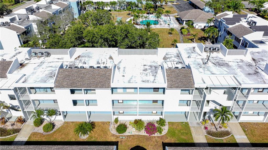 Aerial View Of Building, Courtyard, And Pool Area!