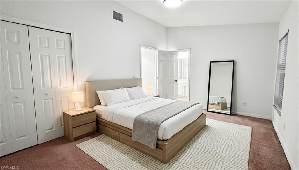 Bedroom with carpet and a closet