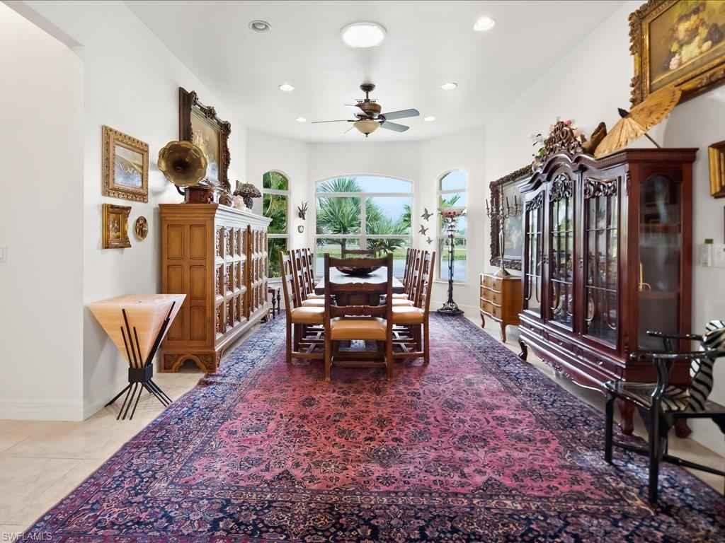Dining area featuring a ceiling fan and recessed lighting