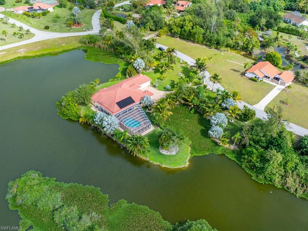Aerial overview of property's location featuring a large body of water