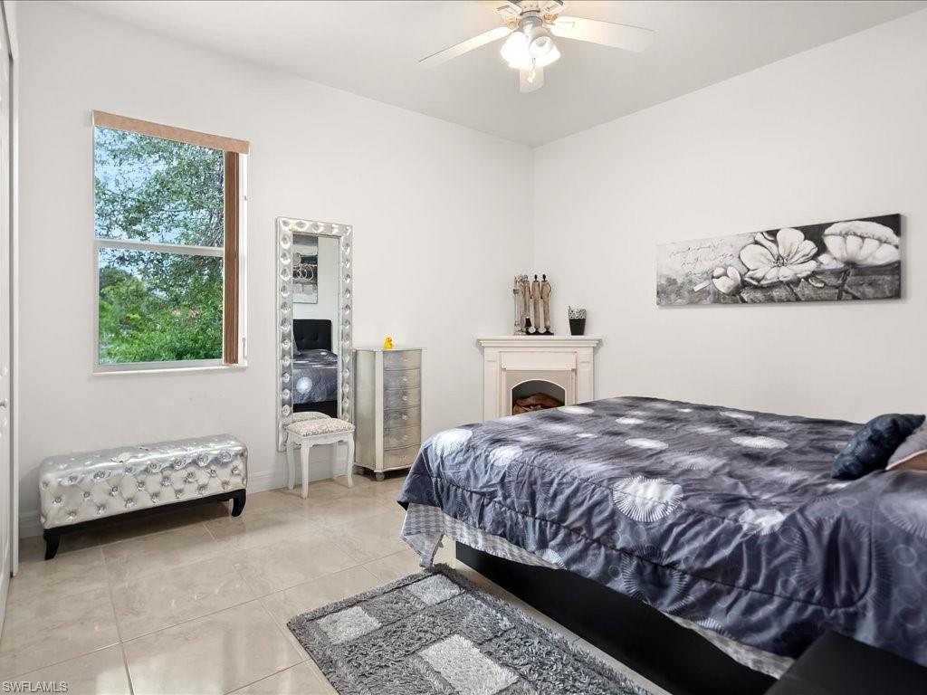 Bedroom featuring a ceiling fan