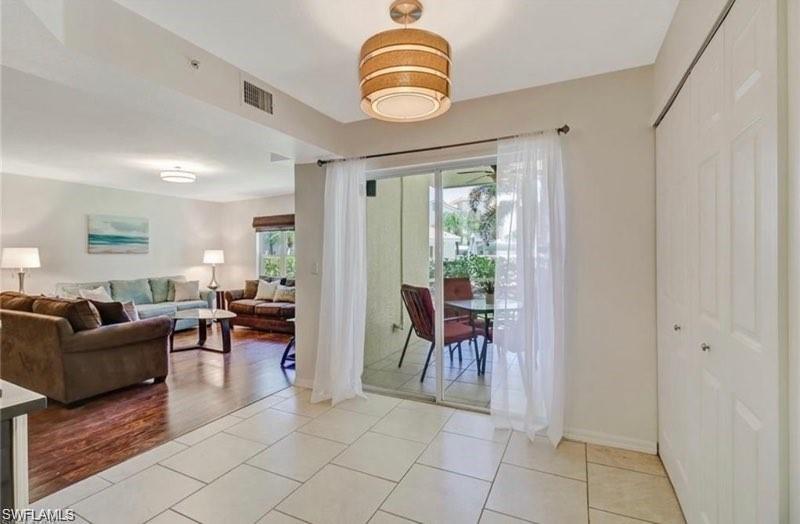 Living room with tile patterned floors