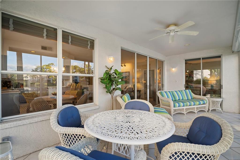Sunroom with ceiling fan, outdoor dining area, an outdoor hangout area, and a patio