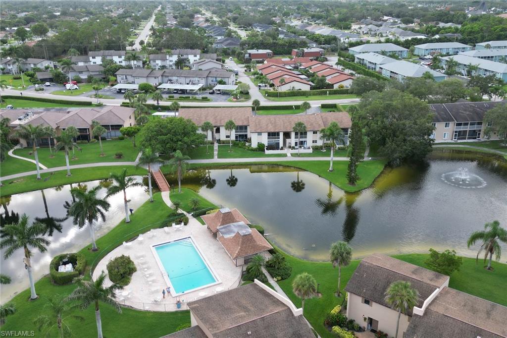 Aerial view of residential area with a large body of water