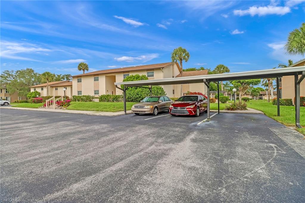 Covered parking lot with a residential view