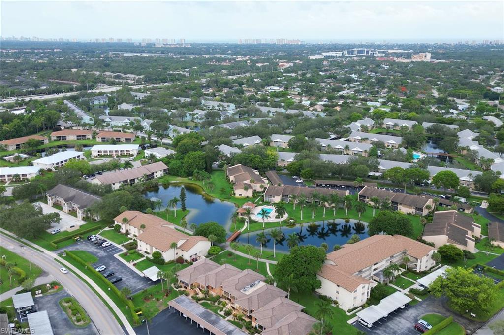 Aerial overview of property's location with a large body of water