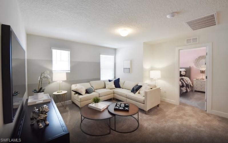 Photos are from a furnished model. Options for this home may vary.