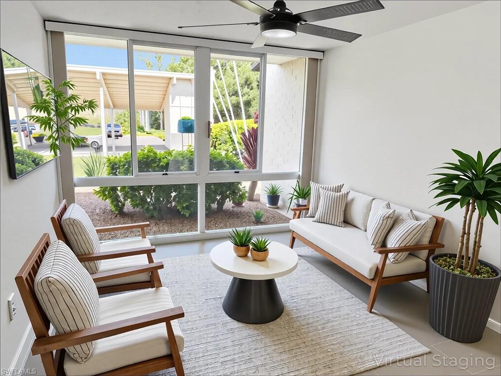 Sunroom with floor to ceiling windows and healthy amount of natural light