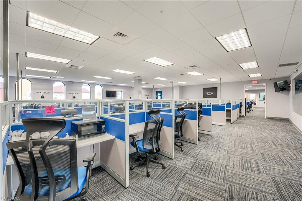 Office area featuring a paneled ceiling