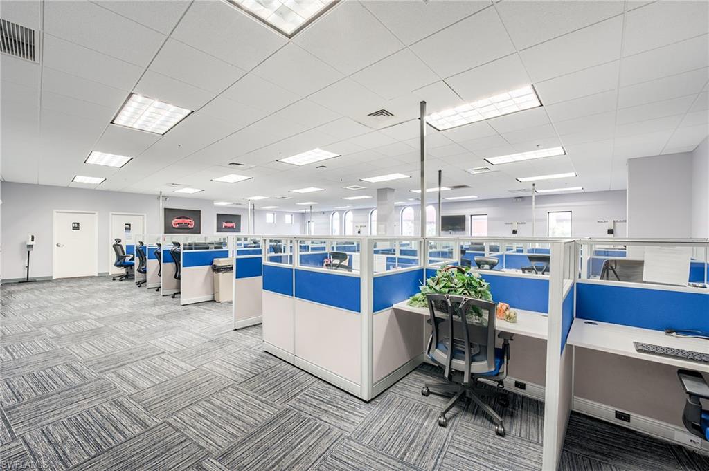 Office area featuring a paneled ceiling