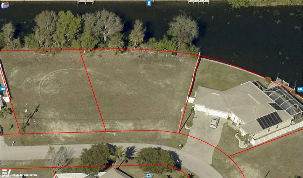 Aerial map of property and surrounding area with property parcel outlined