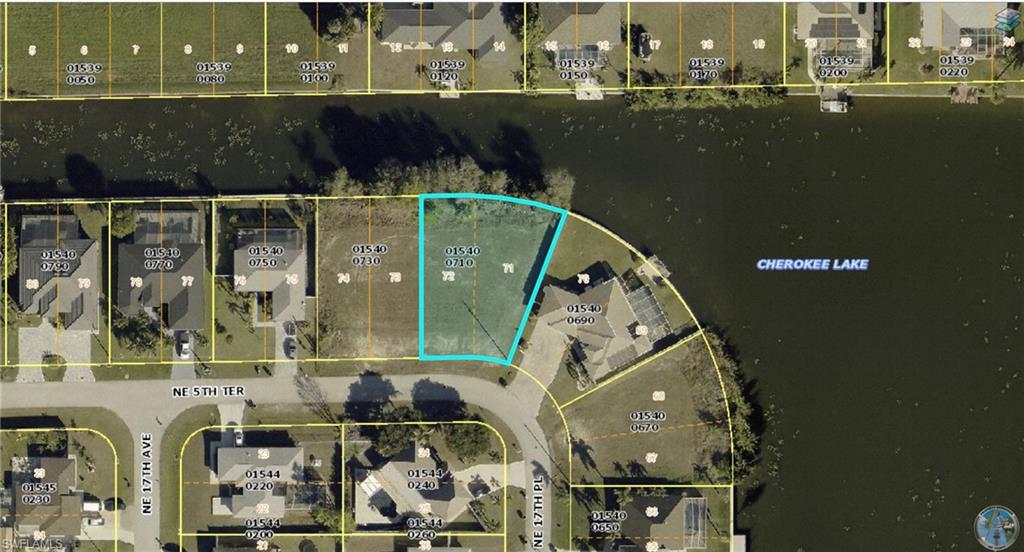 Aerial overview of property's location featuring property parcel outlined