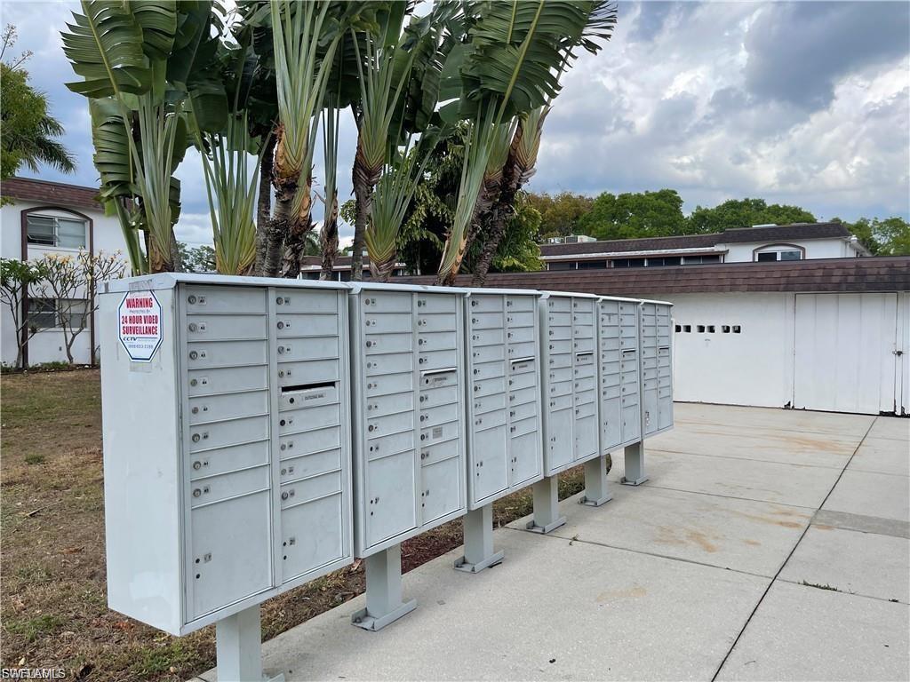 View of home's community featuring mail area