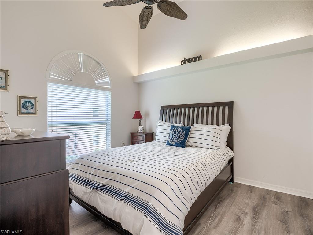 Bedroom featuring wood finished floors and a ceiling fan