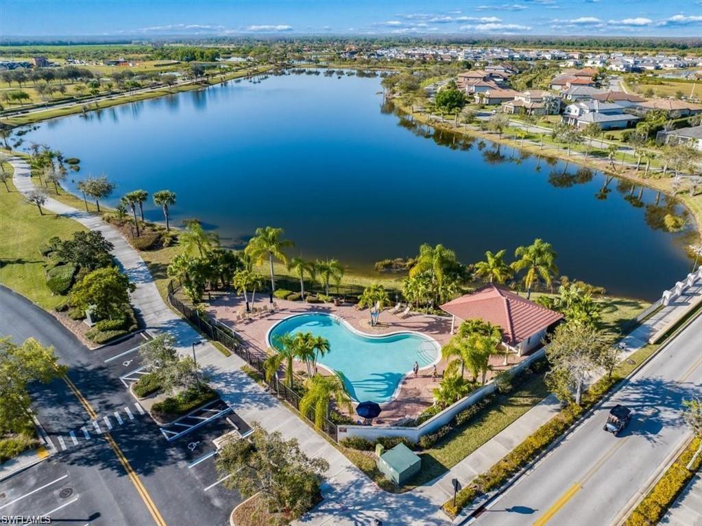 Aerial view of a nearby body of water and a pool area