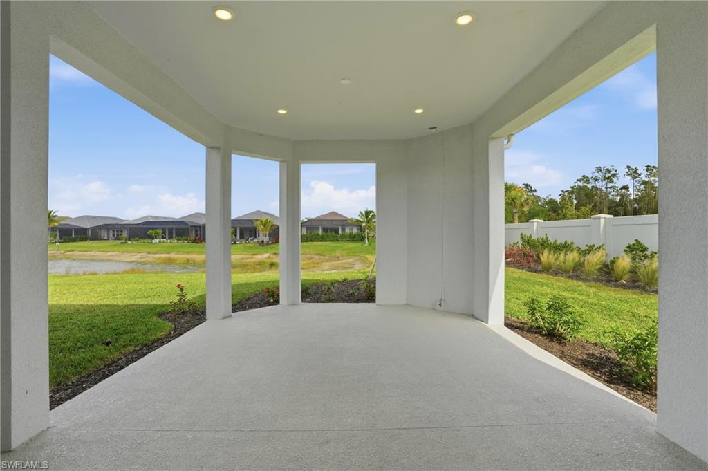 View of patio / terrace with a water view and a residential view
