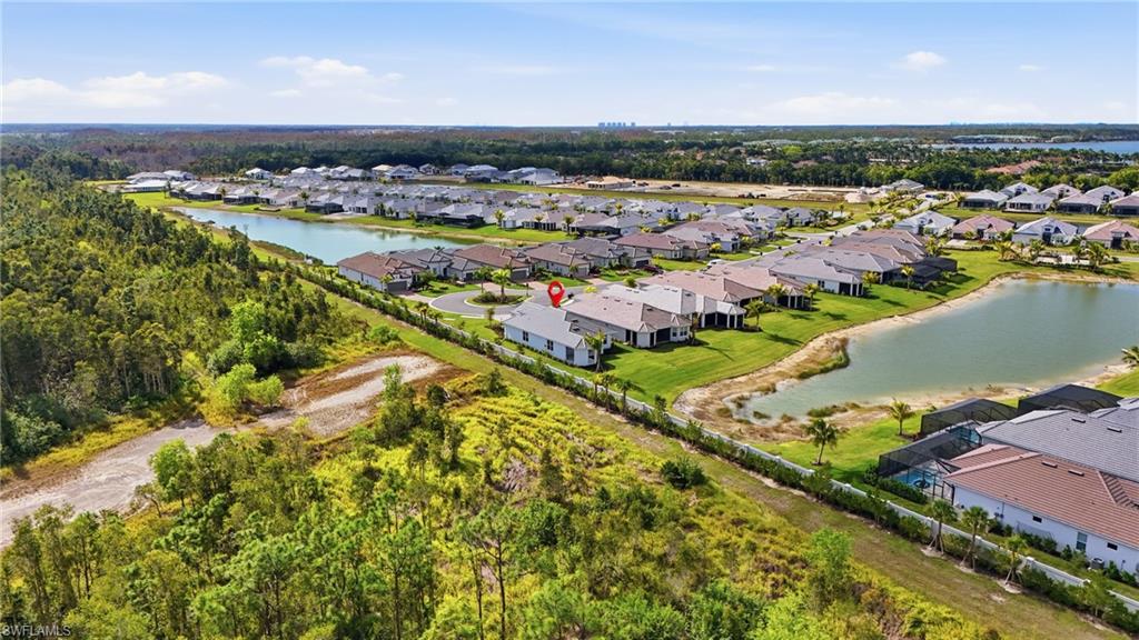 Aerial view of residential area with a nearby body of water