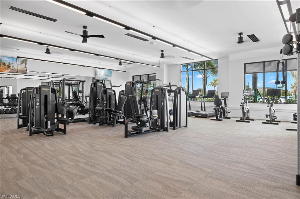 Exercise room featuring ceiling fan