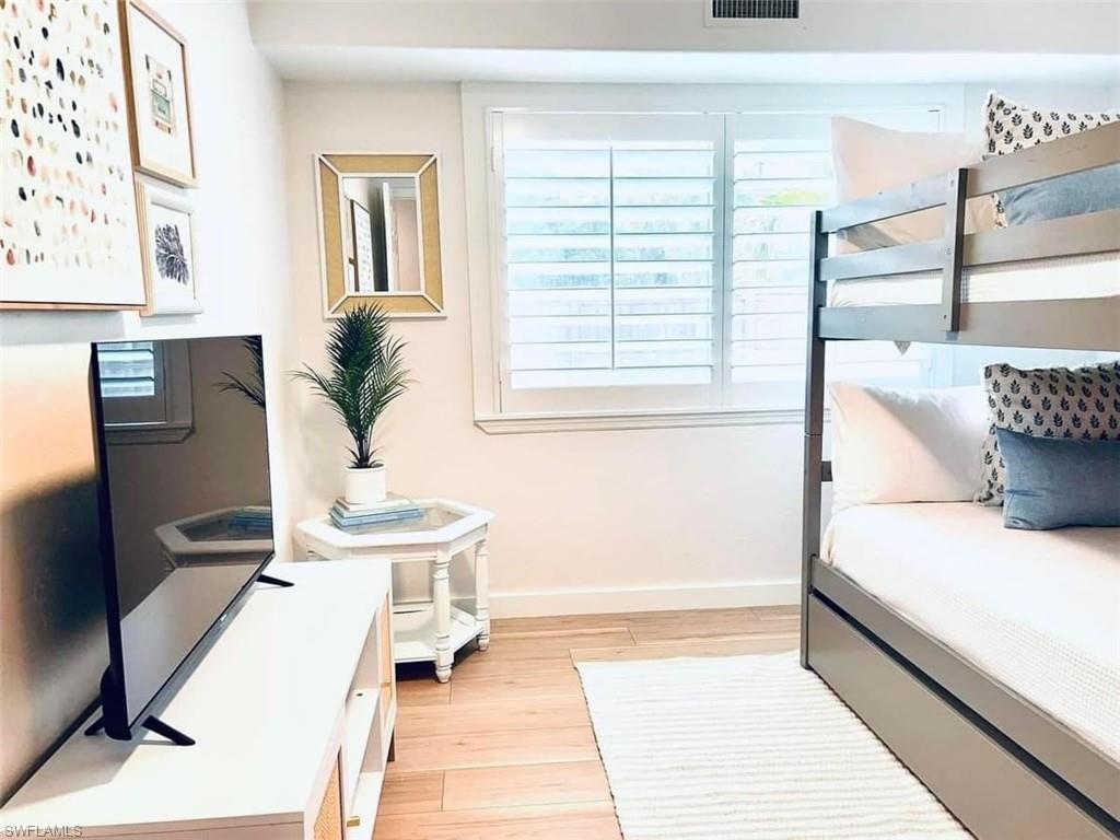 Bedroom featuring light wood-type flooring