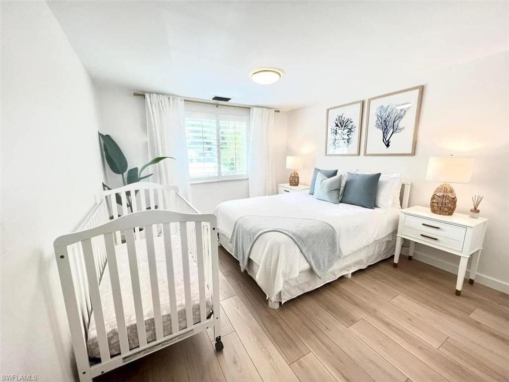 Bedroom featuring light hardwood / wood-style floors