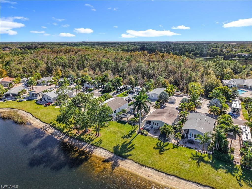 Aerial perspective of suburban area with a forest