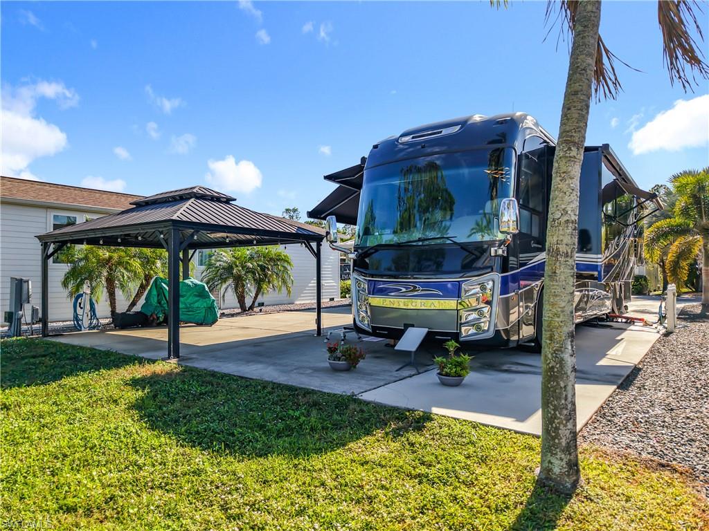 View of community with a yard, a gazebo, and a patio