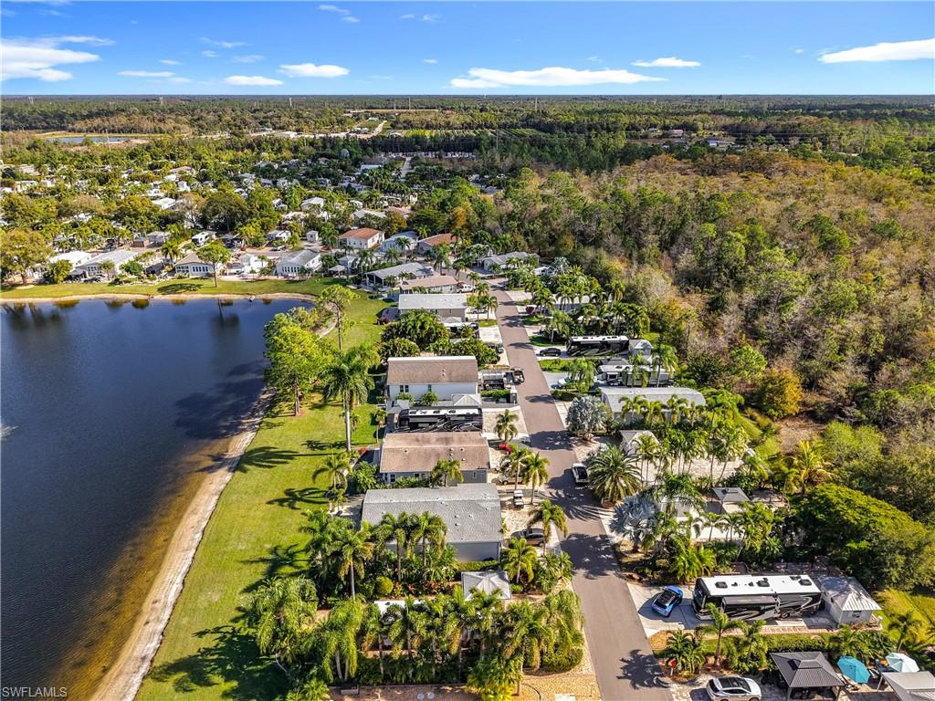 Aerial overview of property's location featuring nearby suburban area and a large body of water