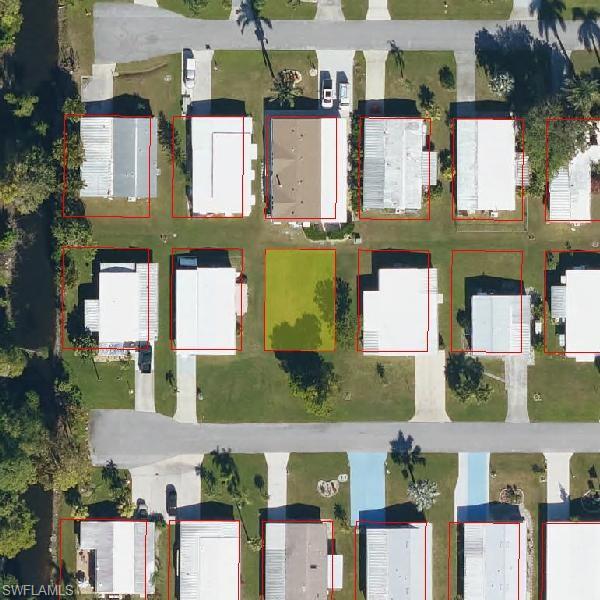 Aerial overview of property's location with property parcel outlined