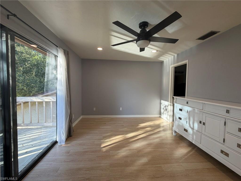 Unfurnished living room with light wood finished floors, ceiling fan, and recessed lighting