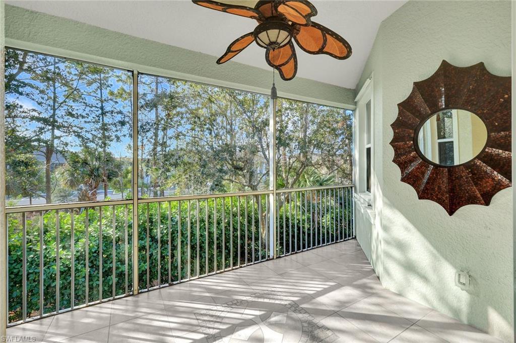 Unfurnished sunroom with vaulted ceiling