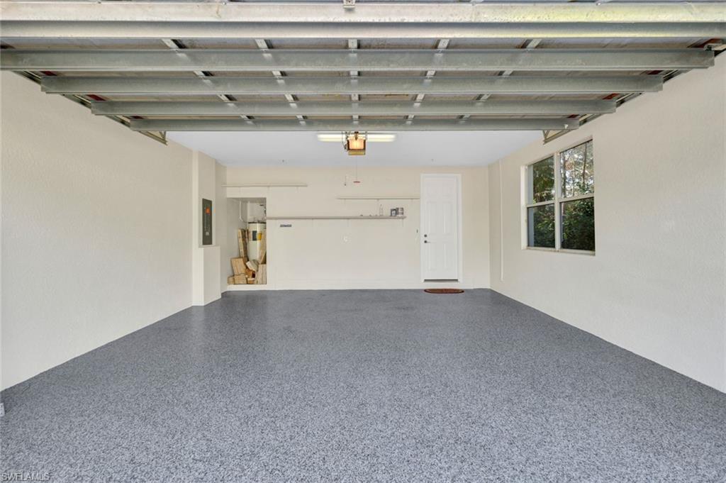 Garage featuring electric panel