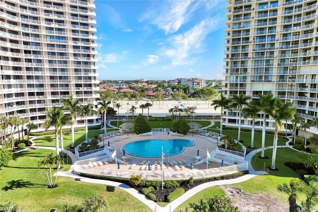 Community pool with a patio area