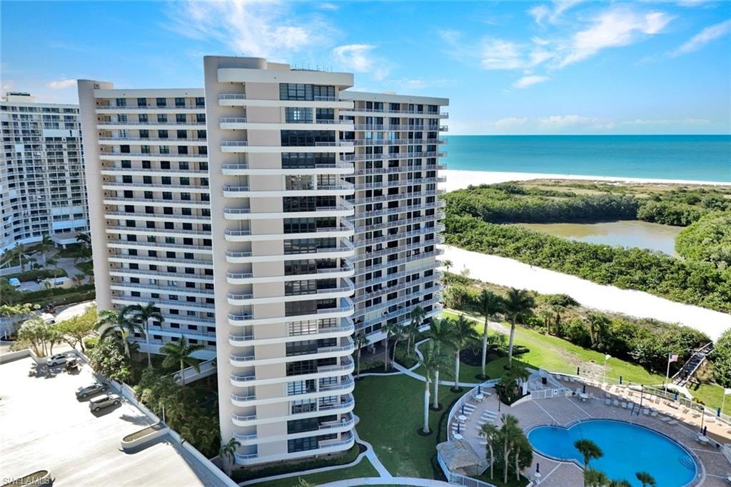View of apartment building / complex with a water view