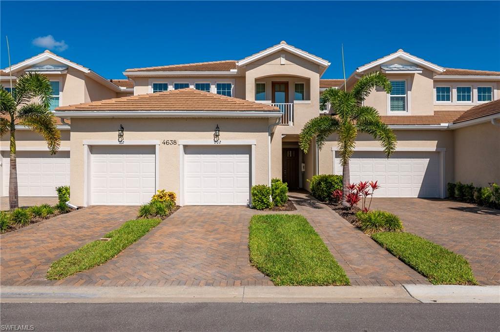 Mediterranean / spanish-style home featuring a tile roof, stucco siding, and a balcony