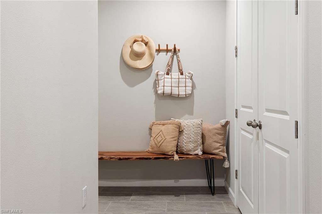 Mudroom featuring baseboards