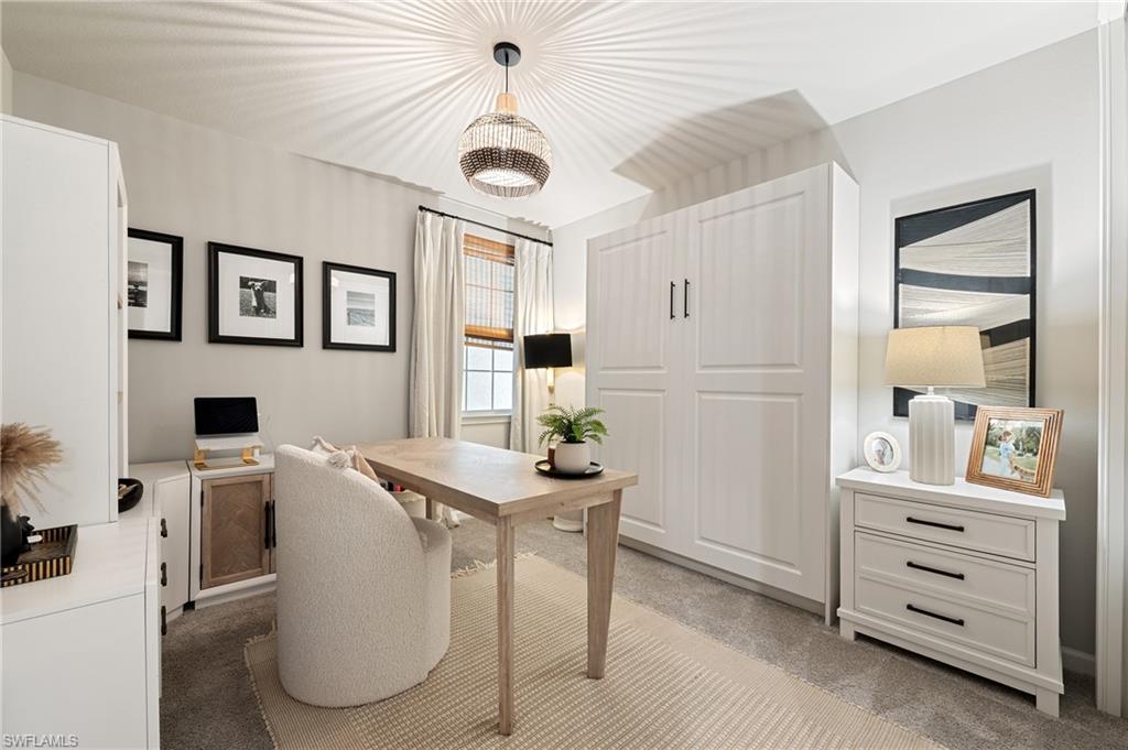 Home office with light carpet