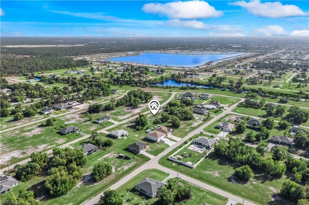 View of the friendly, established neighborhood surrounding the lot.
