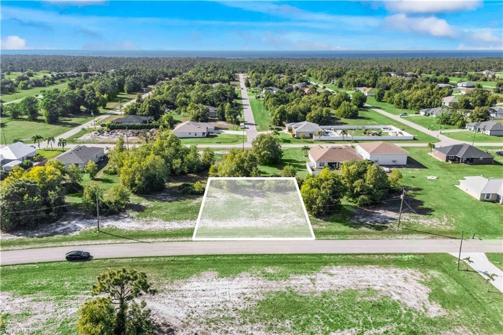 Well-located parcel offering privacy and room to create your vision.