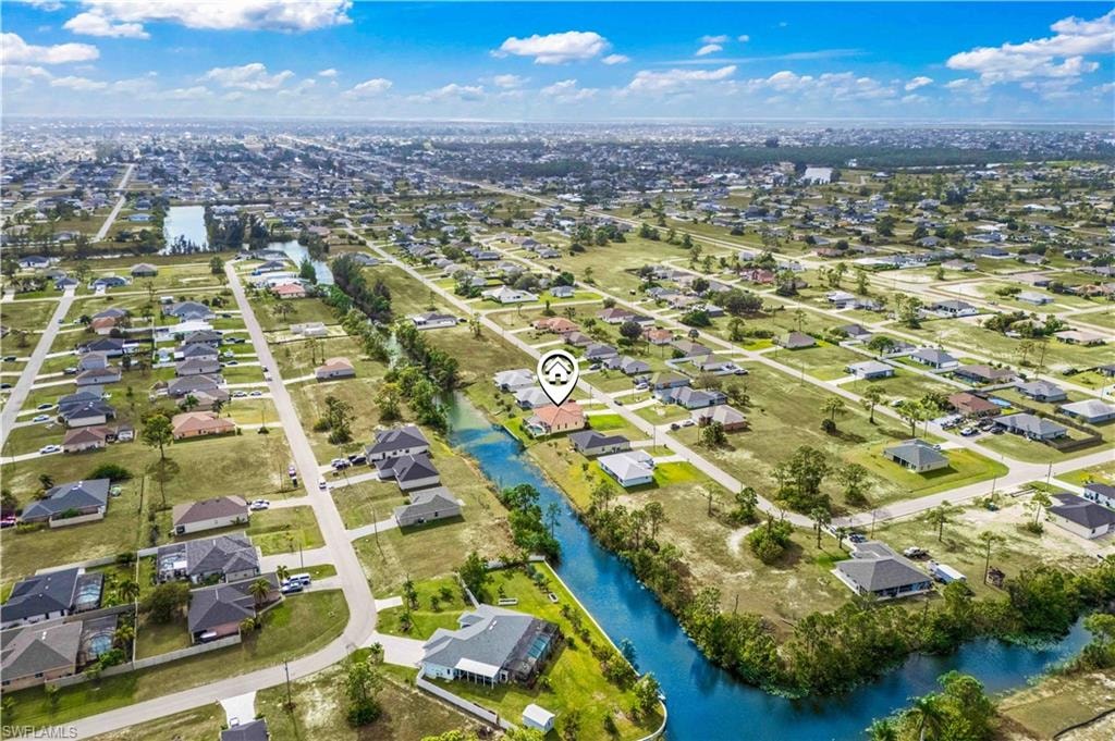 View of property location with nearby suburban area