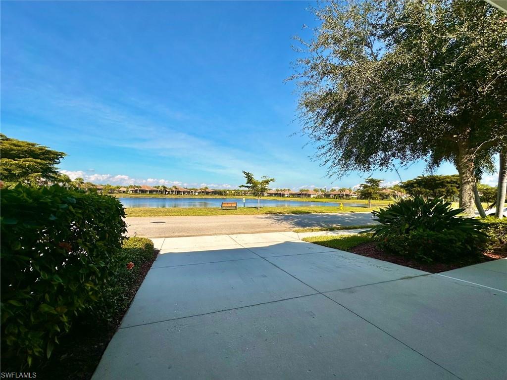 View of patio with a water view